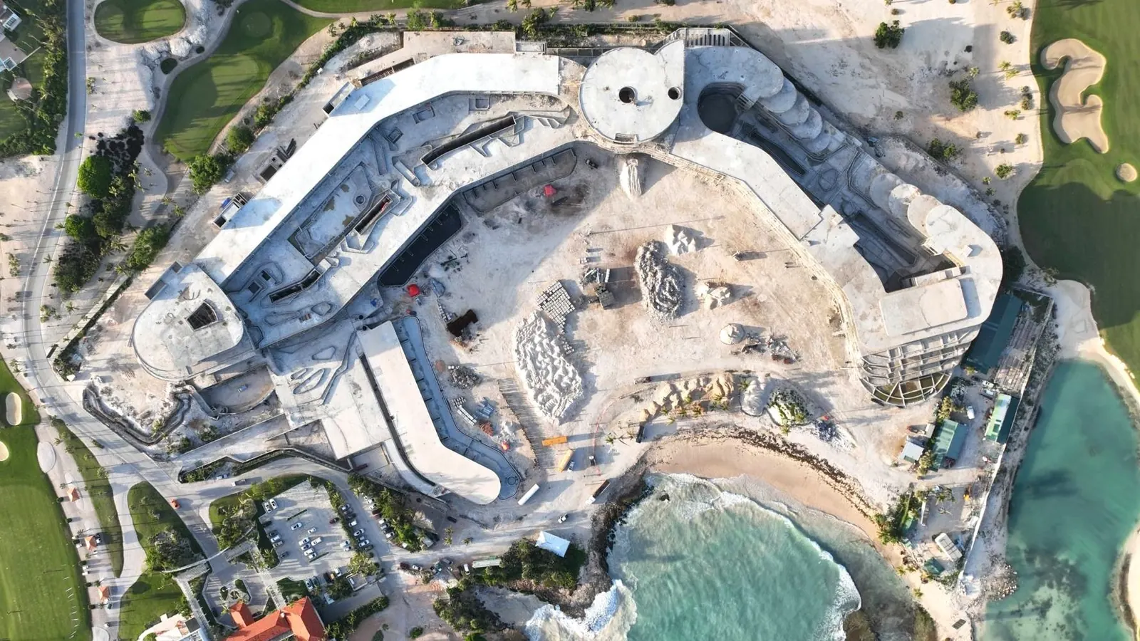 St. Regis Cap Cana under construction: aerial view of the concrete structure next to the beach